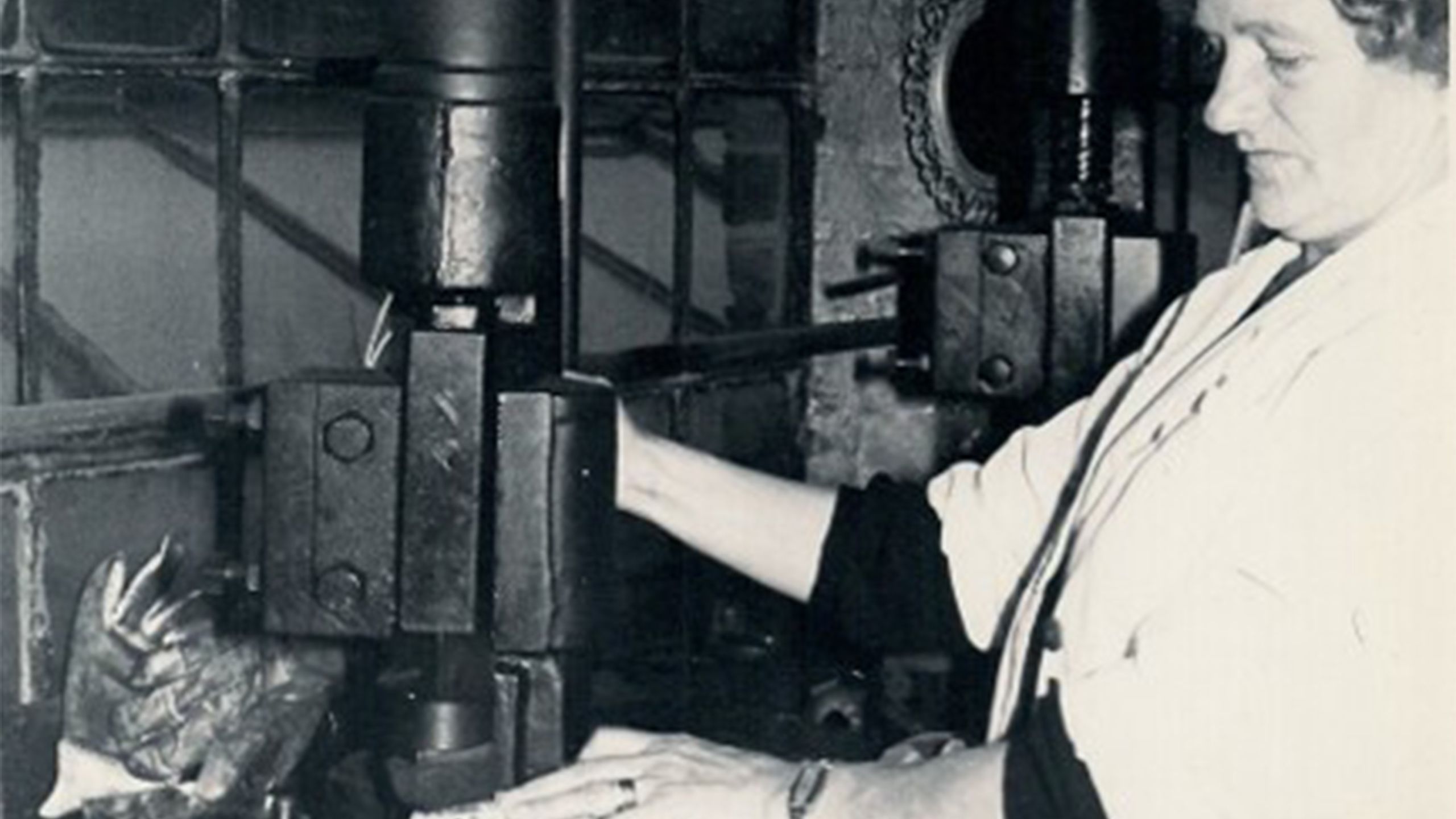 Image: lady, Emily Smith, working a fly press