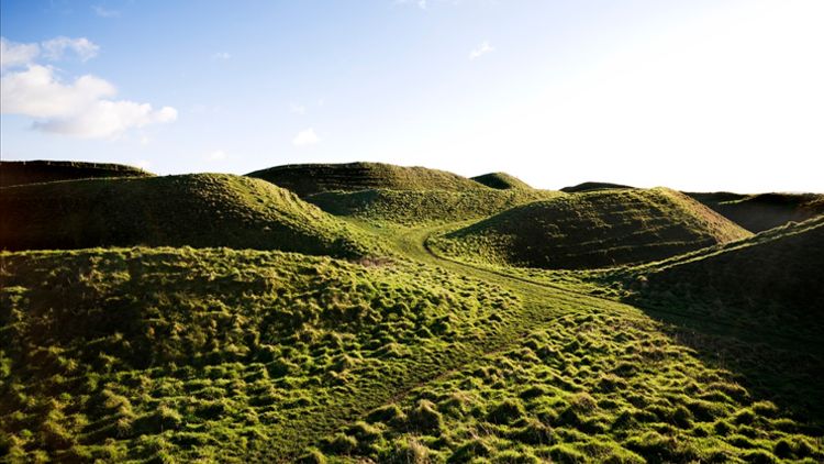 Image: General view of the west entrance ramparts of Maiden Castle © Historic England
