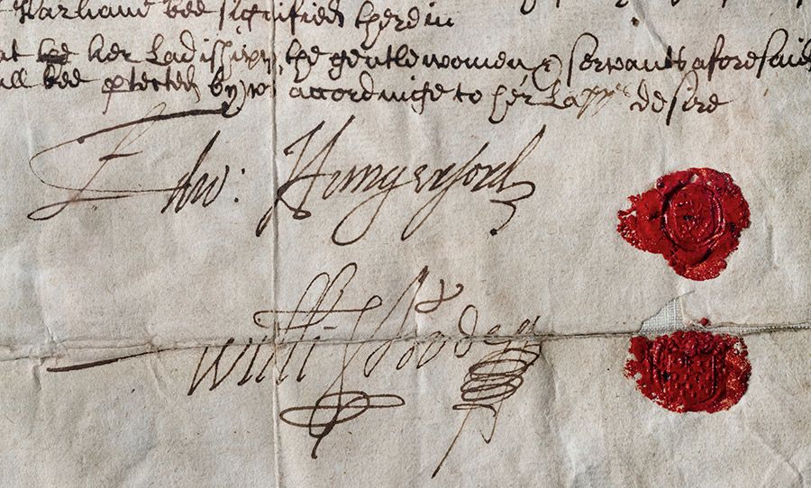 The document surrendering Old Wardour castle in Wiltshire to Sir Edward Hungerford, signed by Lady Blanche Arundell. There are two wax seal next to the respective names of Arundell and Hungerford