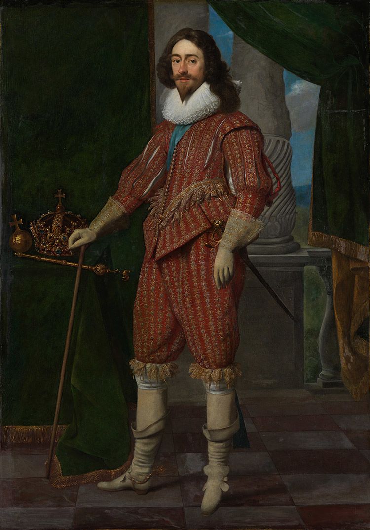 Charles I in 1629, four years after his coronation. He stands in red court dress, with a white collar and long, skin-coloured gloves and boots